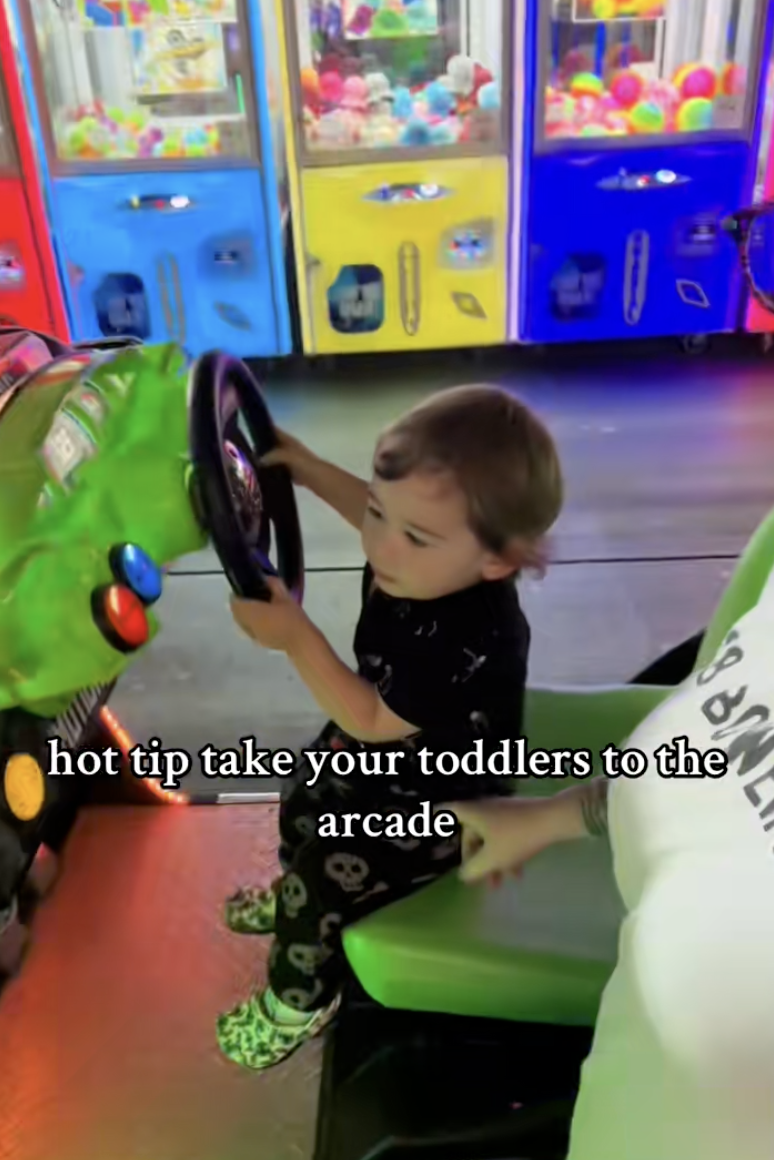 young boy in an arcade