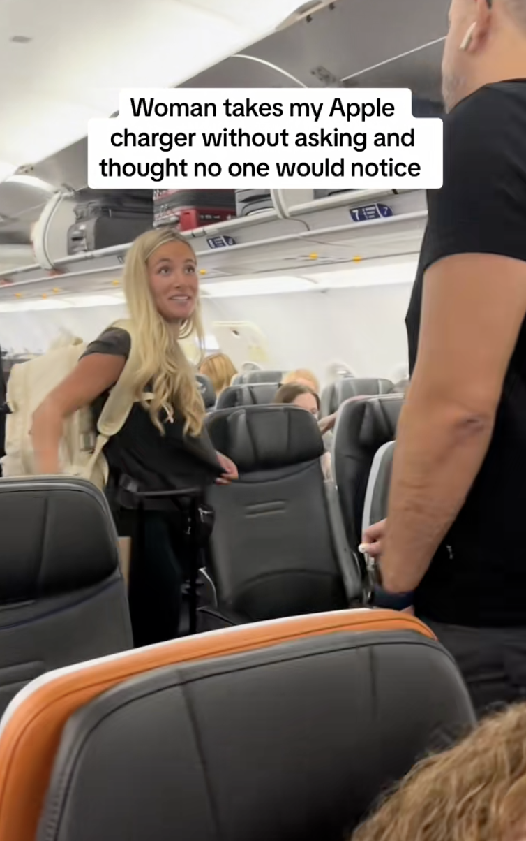 woman standing on a plane