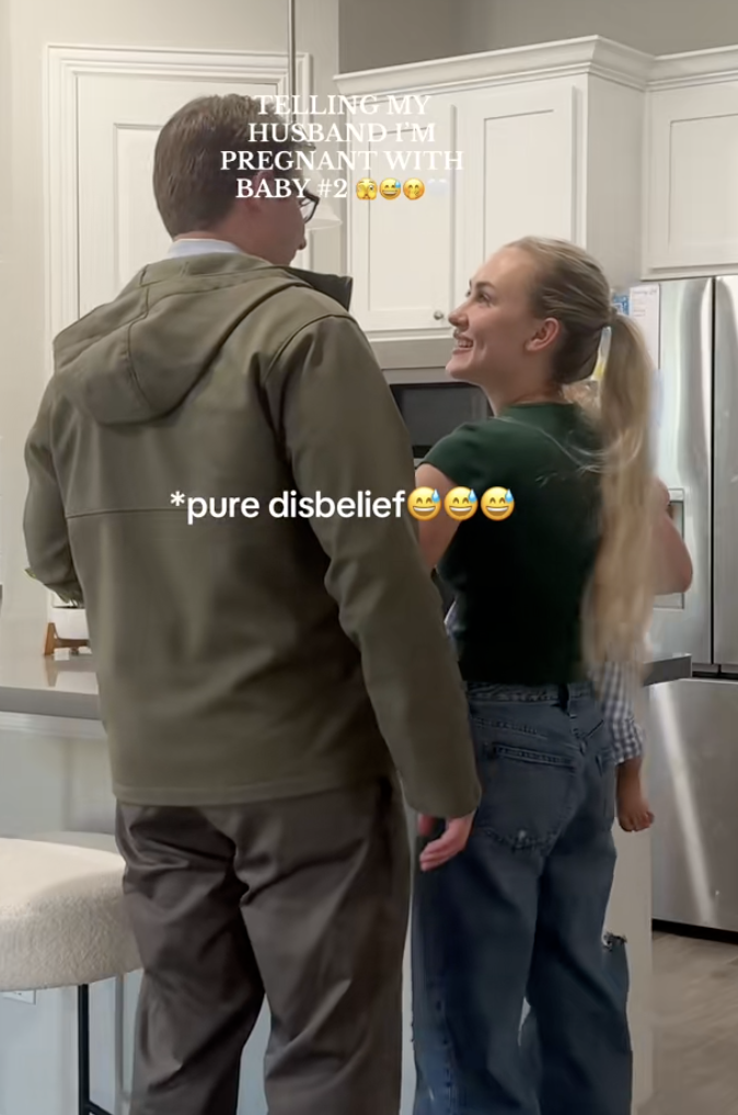 a couple in their kitchen