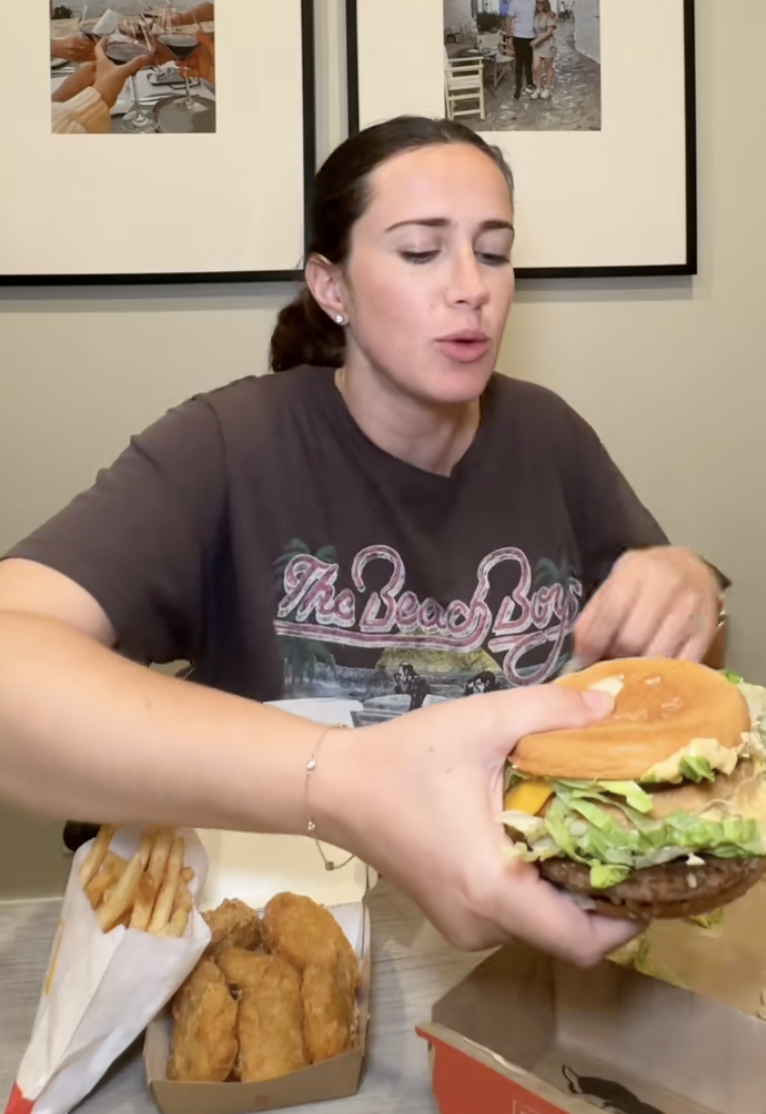 woman eating mcdonald's food