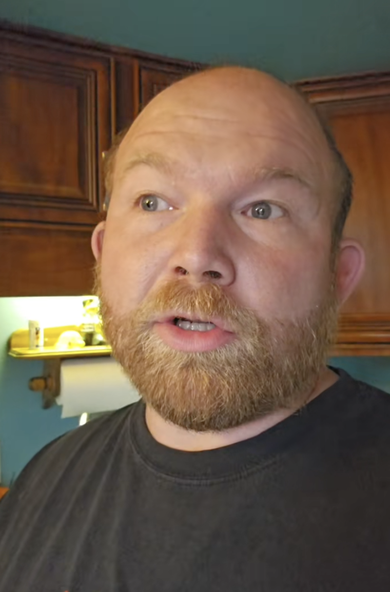 man talking to tiktok viewers