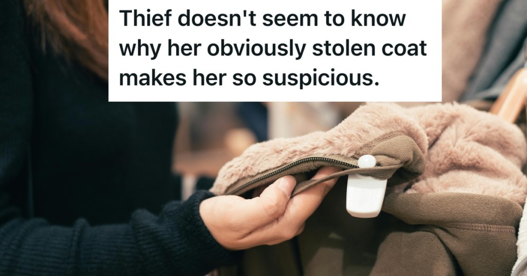 Woman holding a coat with security tag