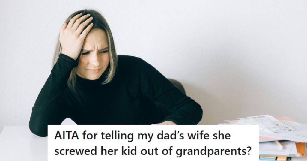 Woman sitting at a table holding her head because she can't believe her stepmom