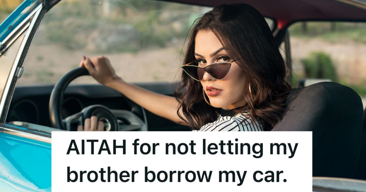 Woman in the driver's seat, looking behind herself