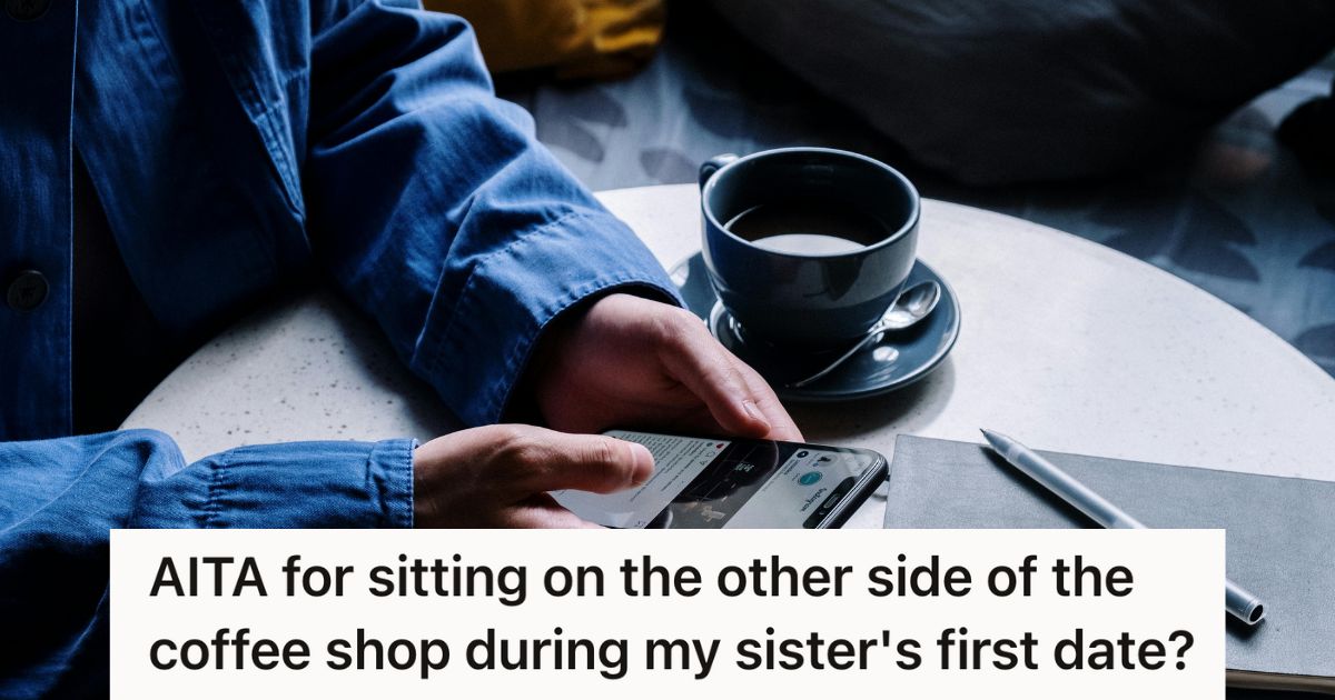 Man on phone beside cup of coffee