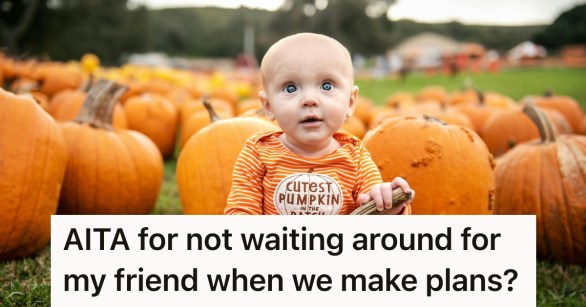 Baby sitting among pumpkins