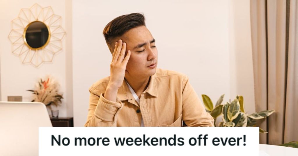 Stressed employee touching his and closing his eyes
