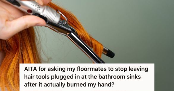 Woman curling her hair using an iron