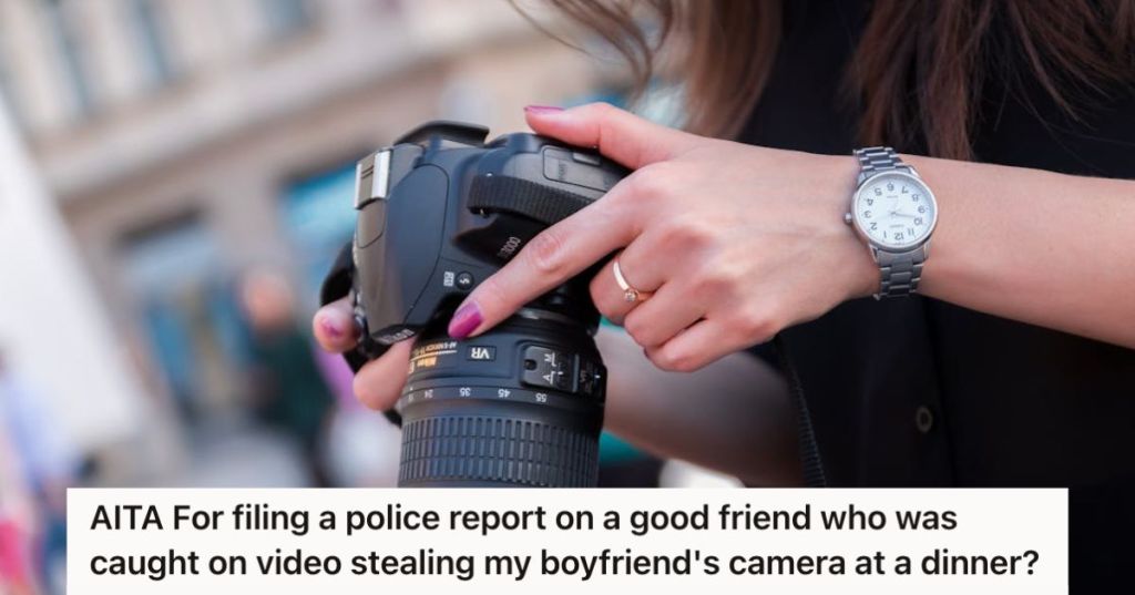 Woman holding a DSLR camera