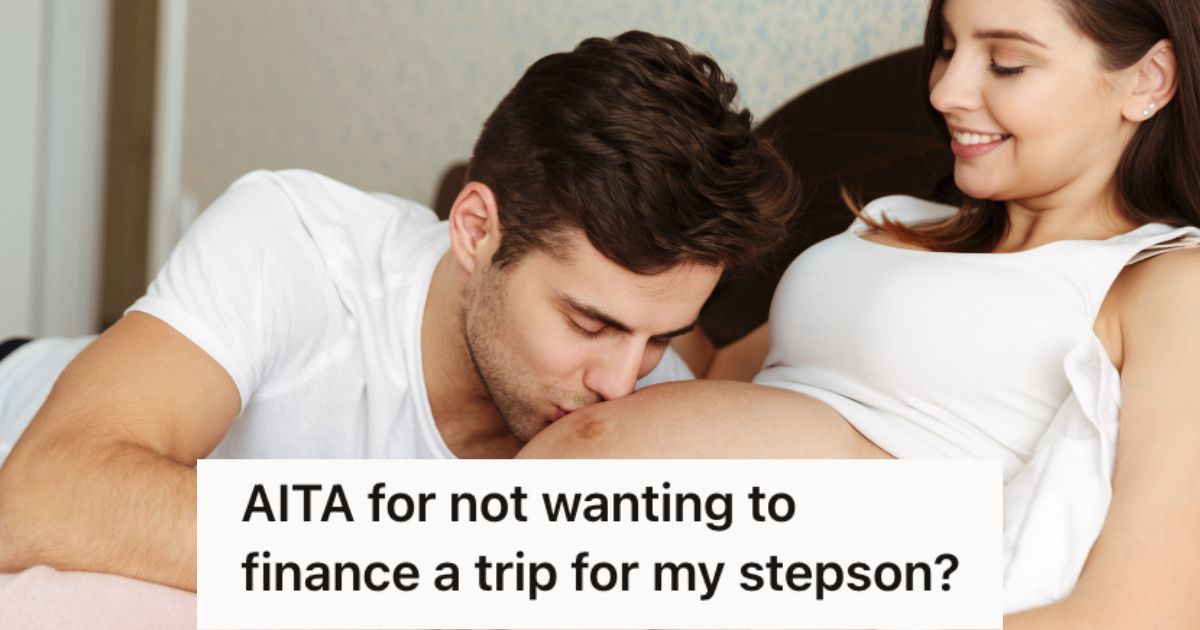 Man kissing the pregnant tummy of his wife