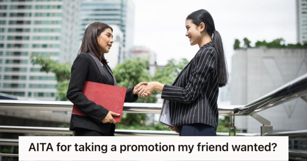 Boss shaking the hands of her employee who got promoted