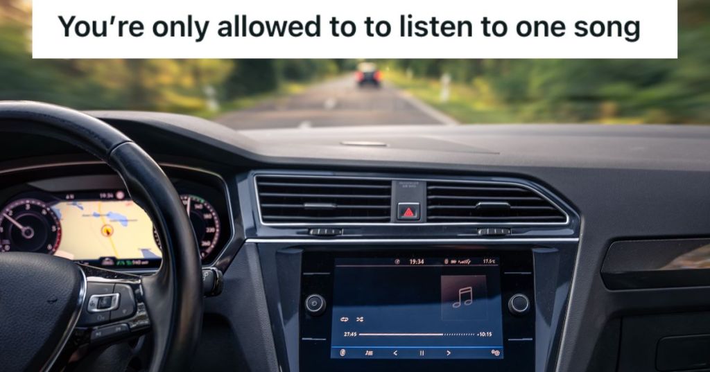 Front view of a car with a music playing on the radio