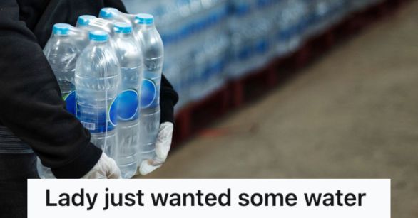 Person carrying a pack of water bottles