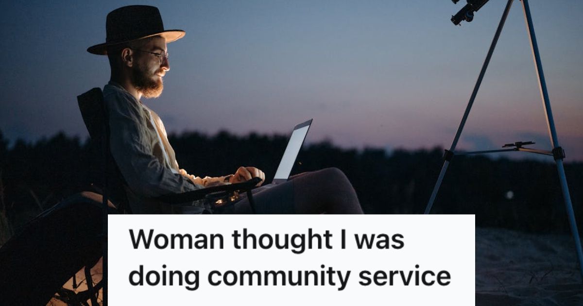 Man sitting on a camp chair with his laptop and tripod