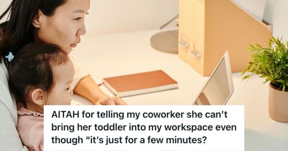 Woman working in front of her laptop while carrying a toddler