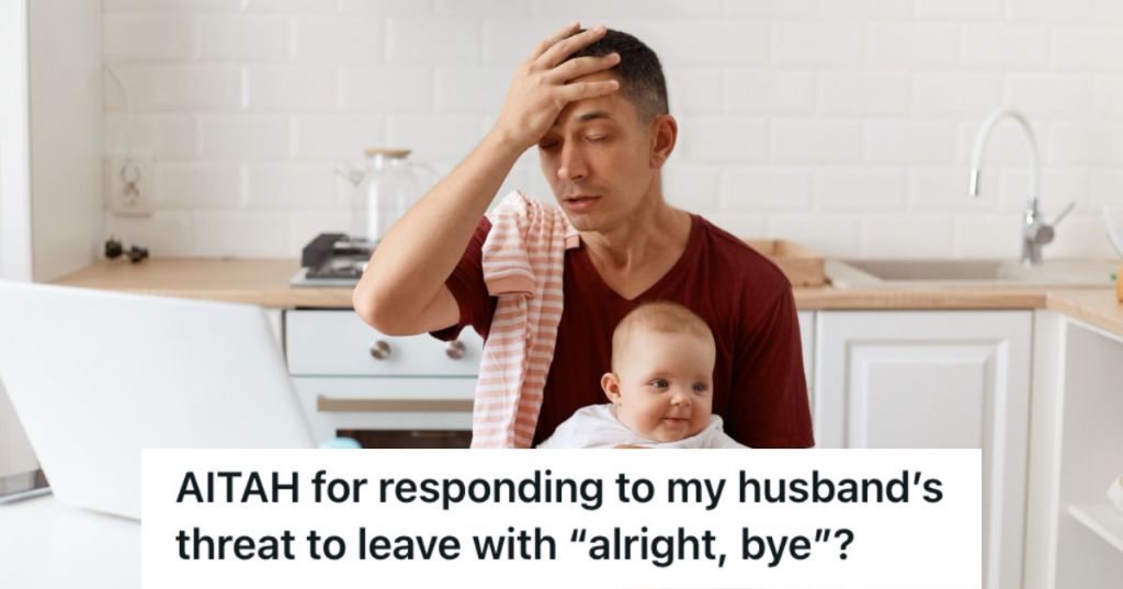 Man stressed with work while carrying baby on his lap