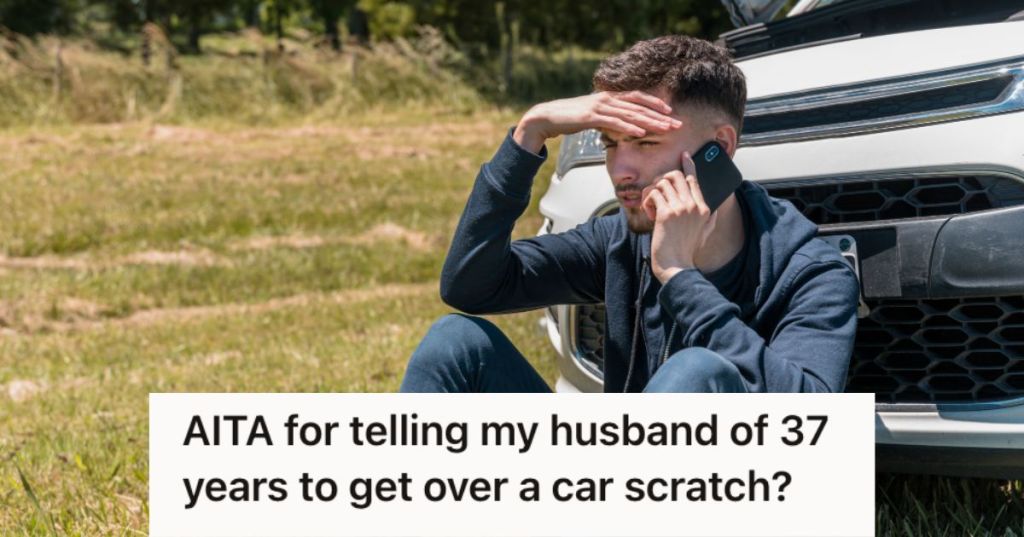 Problematic man sitting in front of his damaged car