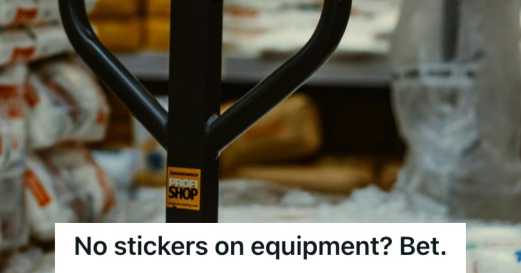 Pallet jack handle with a sticker on it