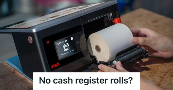 Person putting a paper roll into the cash register