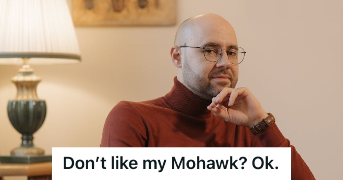 Bald man wearing eyeglasses