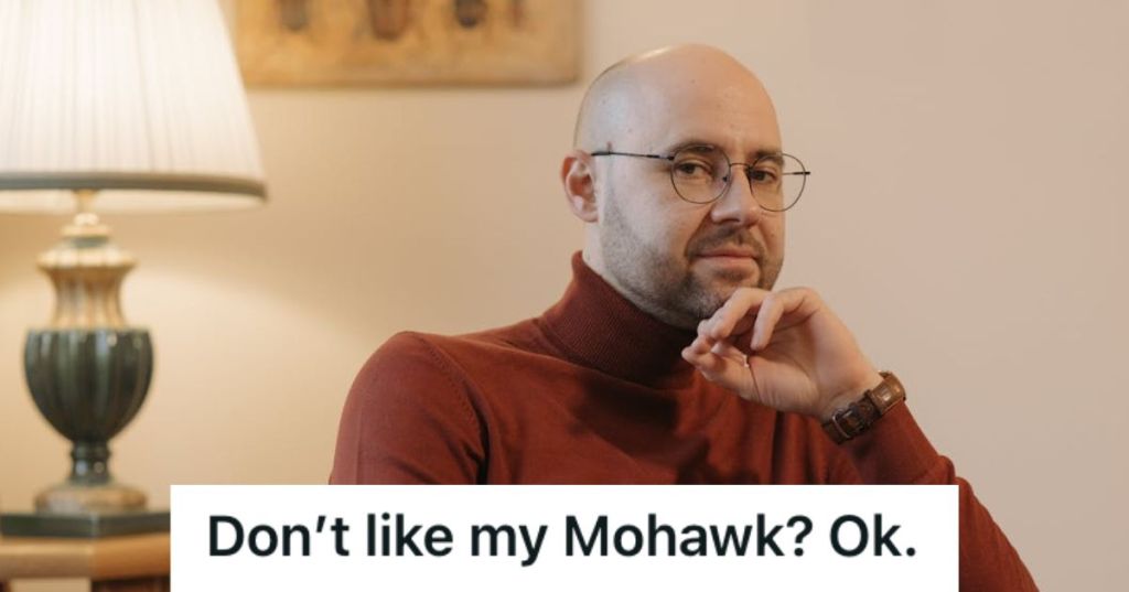 Bald man wearing eyeglasses