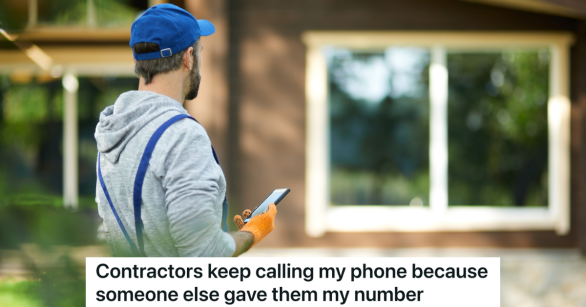 man in blue hat standing outside house