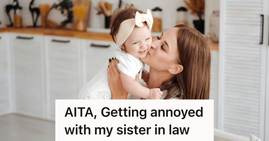 mom holding and kissing baby girl