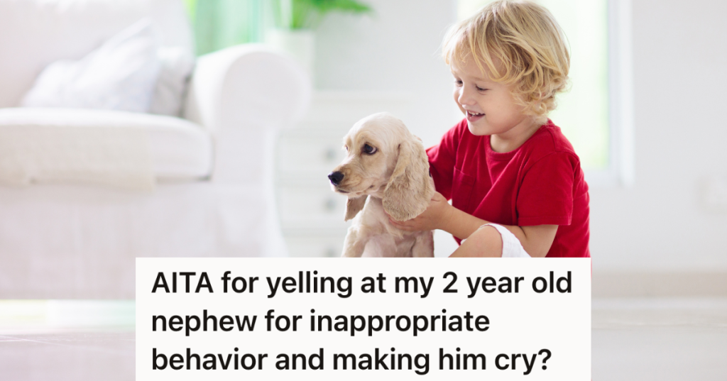 little boy sitting on the floor with a dog