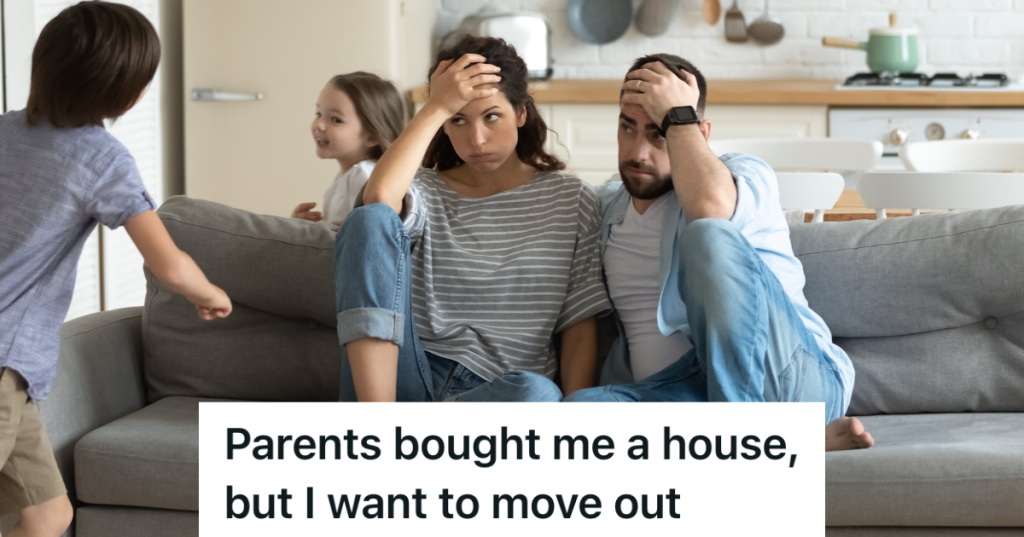 parents sitting on couch while kids run around