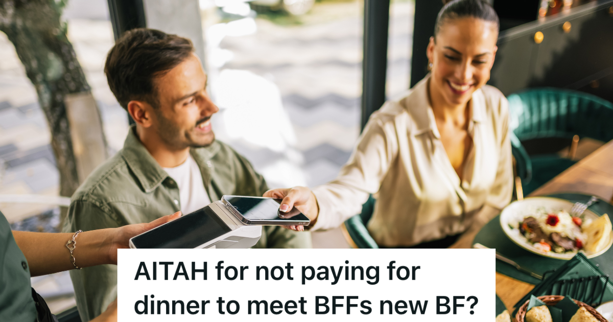 woman paying bill at restaurant