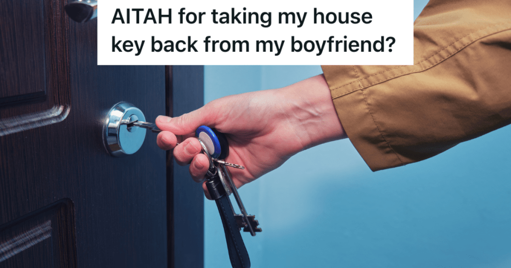 closeup of man unlocking door with key