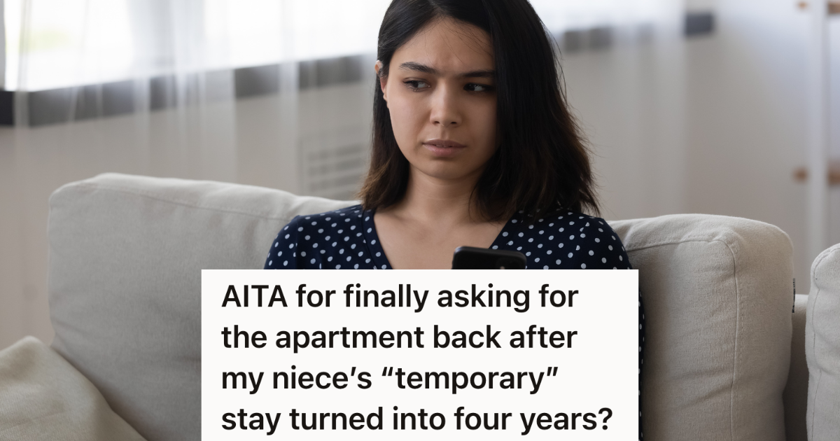 upset woman holding her phone