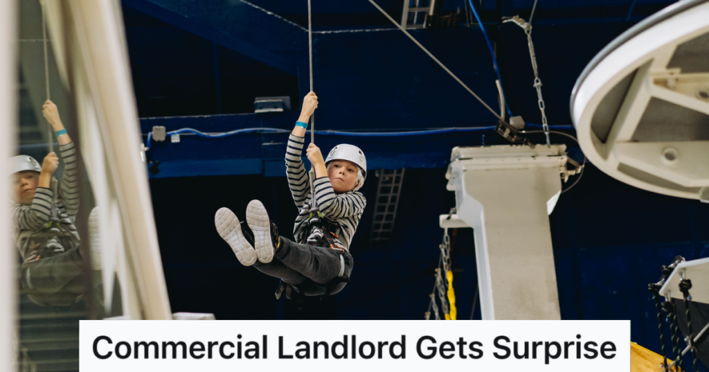 boy on an indoor zip line