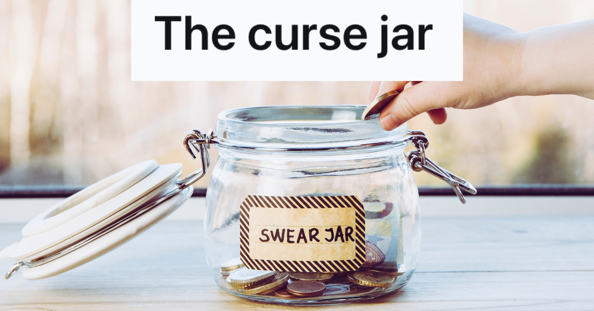 child's hand putting coin in jar that reads "swear jar"