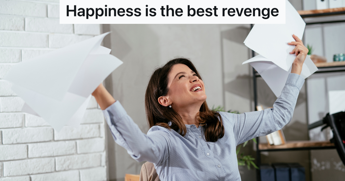 happy businesswoman in office holding papers