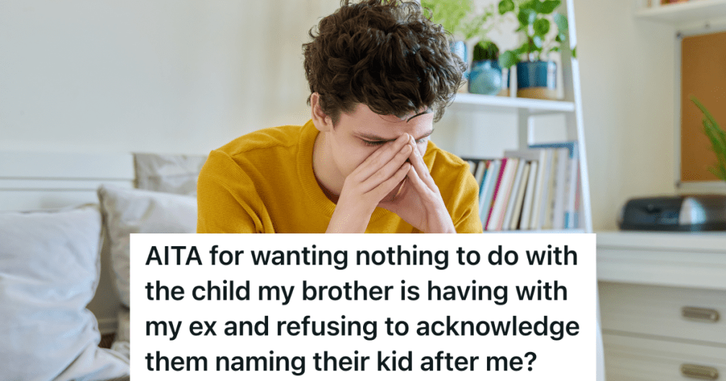 upset young man with his head in his hands