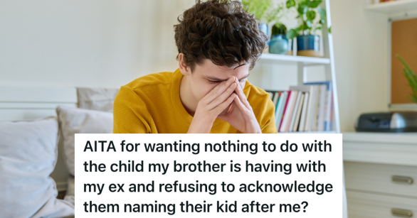 upset young man with his head in his hands