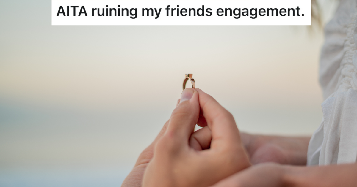 closeup of man holding engagement ring