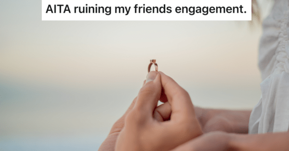 closeup of man holding engagement ring