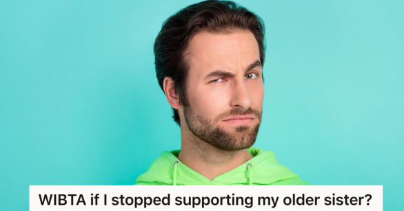 man in green shirt raising one eyebrow