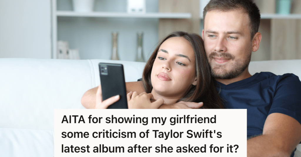 couple cuddling and looking at phone