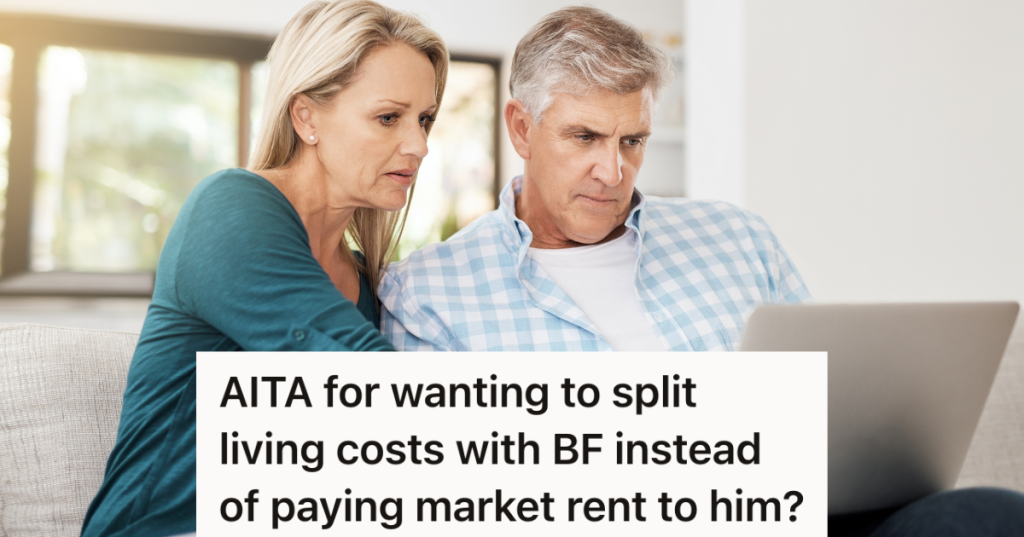 middle aged couple looking at bills