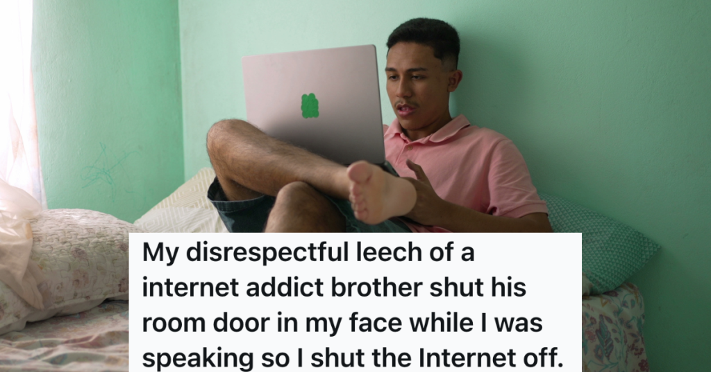 young man in bed with his computer