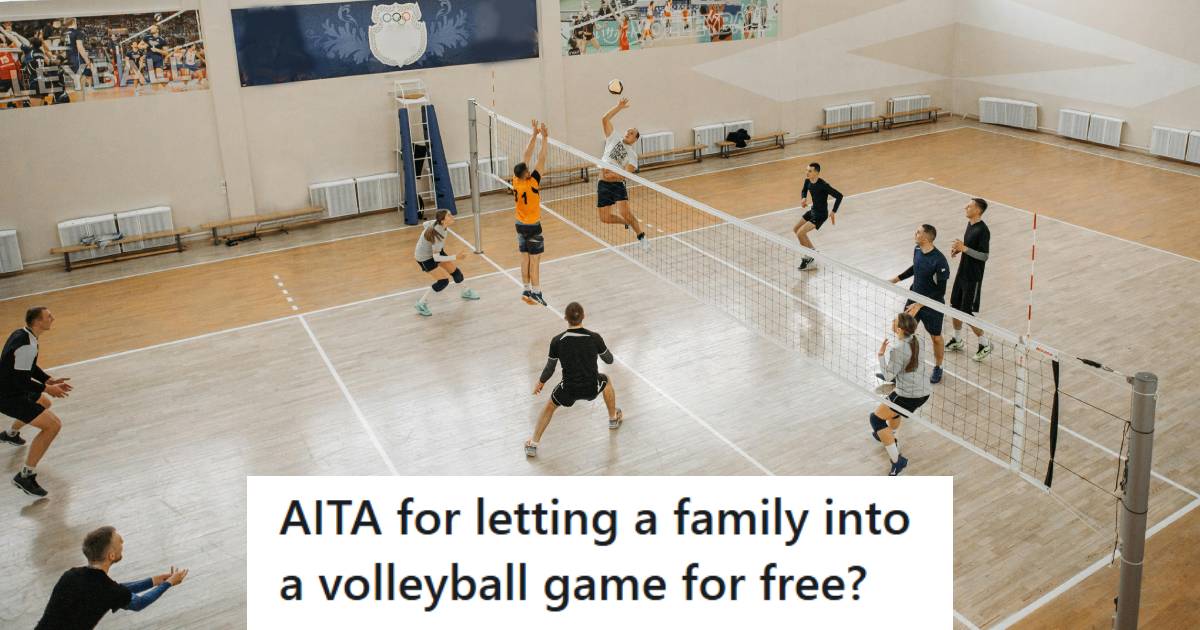 High school volleyball game going on with visitors in the crowd