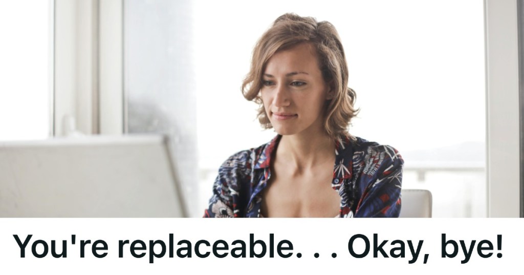 smiling woman working at her laptop