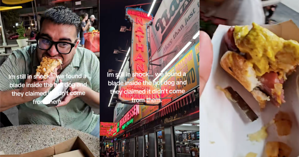man eating a hot dog