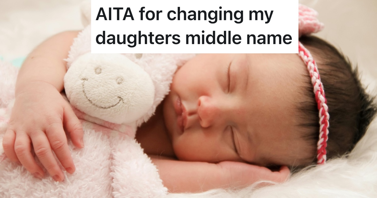 newborn baby girl asleep with headband on and cuddling stuffed animal