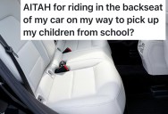 Mom Sits In The Backseat To Watch A Movie With Her Toddler, But Her Husband Says She’s Making The School Pickup “Harder Than It Needs to Be”