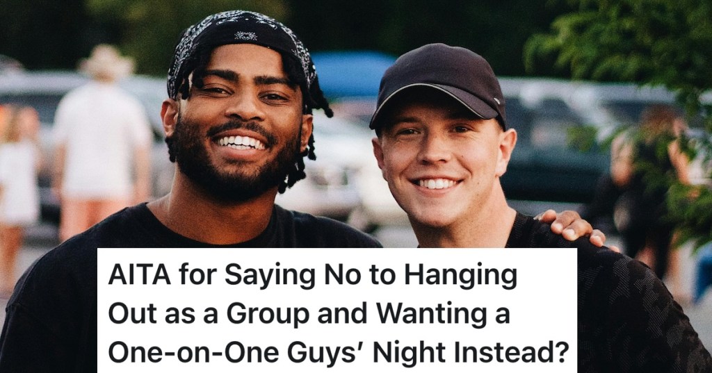two male friends smiling at the camera