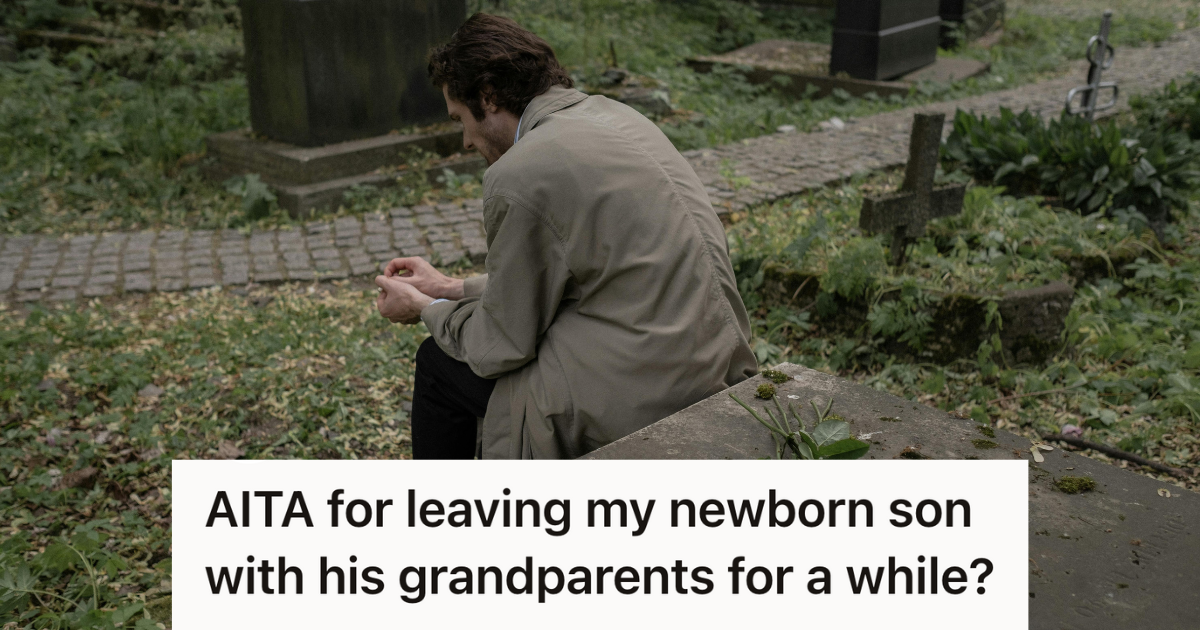 grieving man sitting in a cemetery